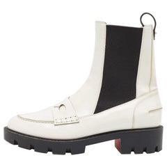 Christian Louboutin Stivali alla caviglia Montezu in vernice bianca taglia 38