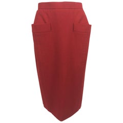 Vintage Yves Saint Laurent brick red wool skirt with hip front pockets 1980s