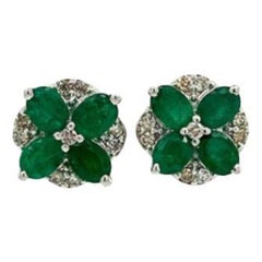 Faceted Emerald Diamond Flower Stud Earrings for Mom Crafted in Sterling Silver