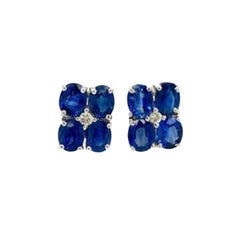 September Birthstone Sapphire and Diamond Flower Stud Earrings in 925 Silver
