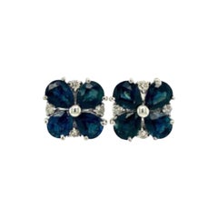 Blumen-Ohrstecker aus 925 Silber mit tiefblauem Saphir und Diamant