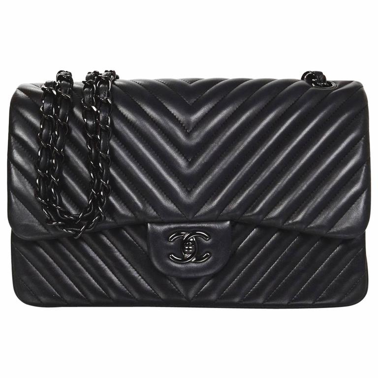 CHANEL - Jumbo Classic Flap CC Quilted Black Lambskin Shoulder Bag