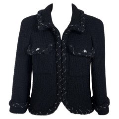 Chanel Iconic Anna Wintour Chaqueta de tweed negra con adornos de cadenas 38 FR