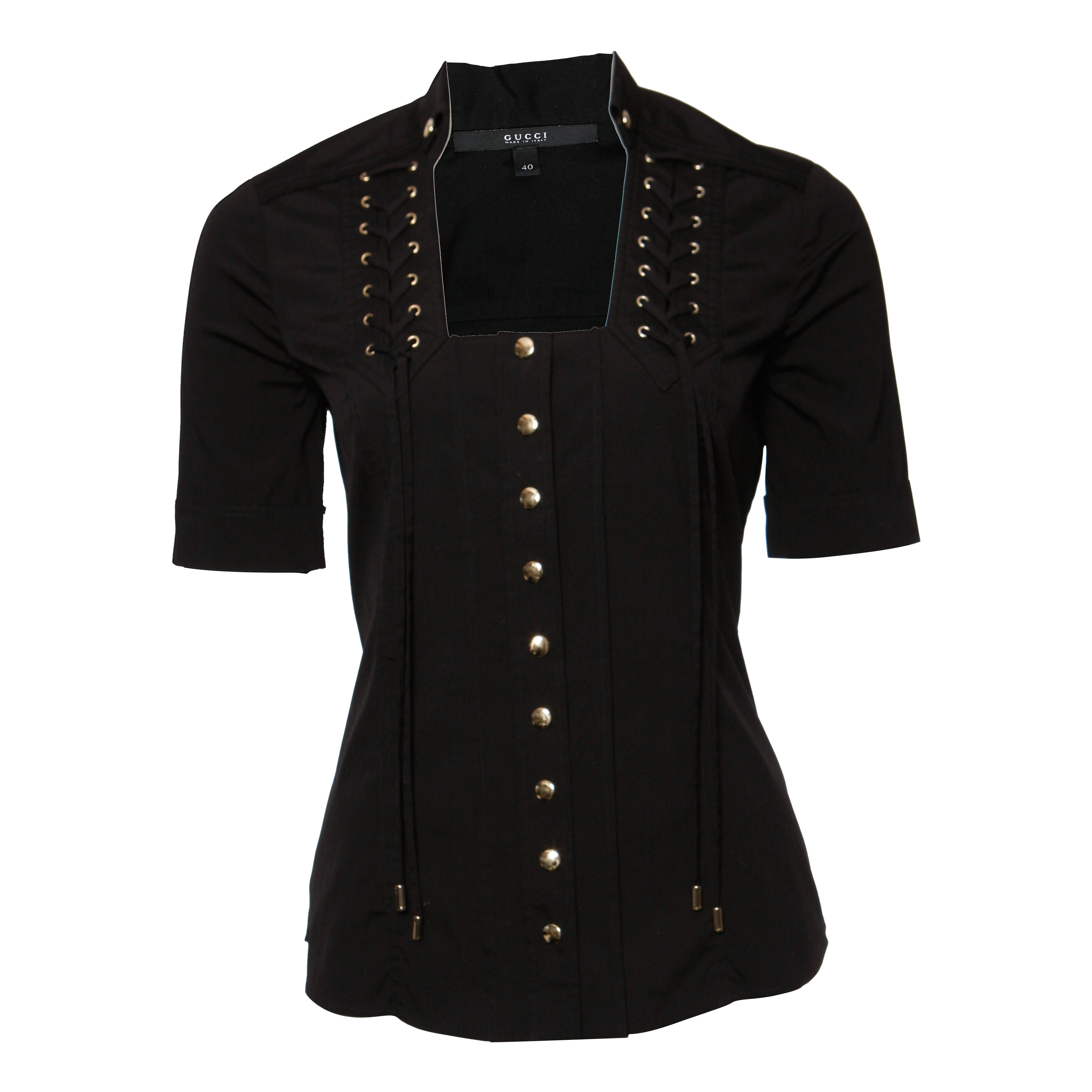 Gucci, Top negro con botones dorados. en venta