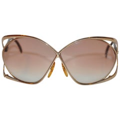 Christian Dior - Superbes lunettes de soleil dorées à monture dorée avec bras en lucite marron