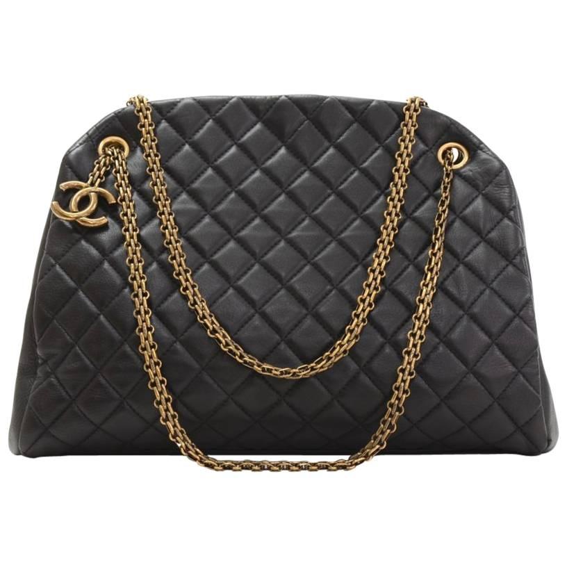 Chanel Mademoiselle Black Quilted Calfskin Leather Shoulder Bowling Bag at 1stDibs chanel