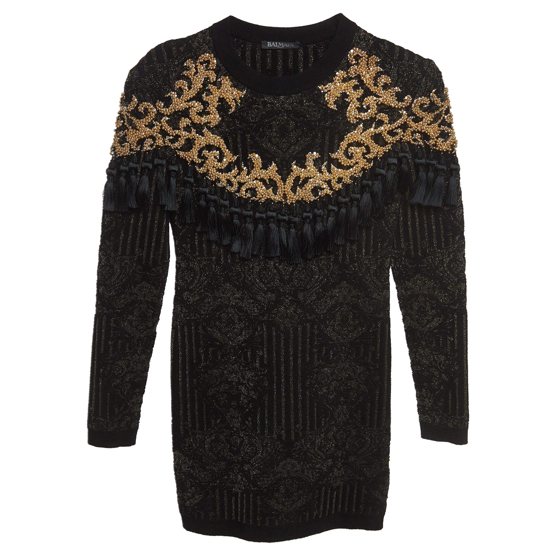 Vestido con borlas de punto jacquard negro/oro Balmain (12 años) en venta