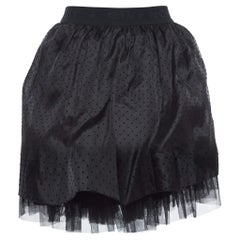 Givenchy Schwarzer gepunkteter gestufter Seidenrock (10 Yrs)