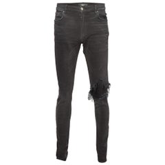 Amiri Schwarze gewaschene & bearbeitete Denim-Jeans im Used-Look L Taille 34"
