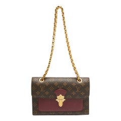 Louis Vuitton Raisin Monogram Canvas Victoire Bag