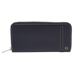 Portefeuille zippé en cuir noir de Tumi