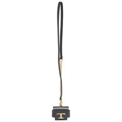 Tod's Étui Timeless pour AirPods en cuir noir avec lanière