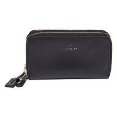 Portefeuille en cuir noir à double fermeture éclair de Coach