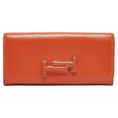 Tod's Portefeuille continental à rabat en cuir orange brûlé