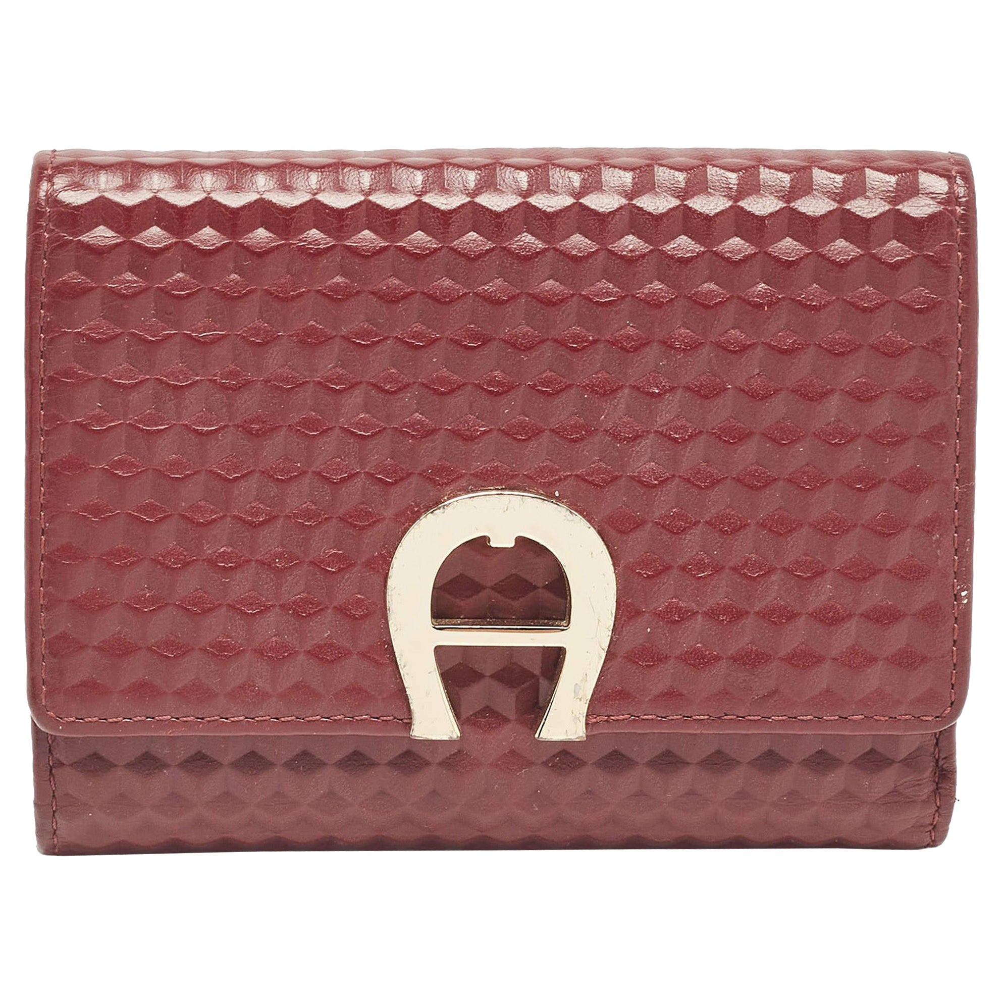 Aigner Burgundy Embossed Leather Genoveva Trifold Compact Wallet For Sale