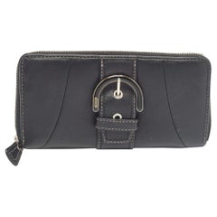 Portefeuille continental en cuir noir à boucle et fermeture éclair de Coach