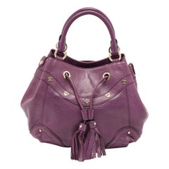 MCM - Sac à bandoulière en cuir violet clouté à cordon de serrage