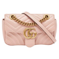 Gucci - Mini sac à bandoulière GG Marmont en cuir matelassé rose