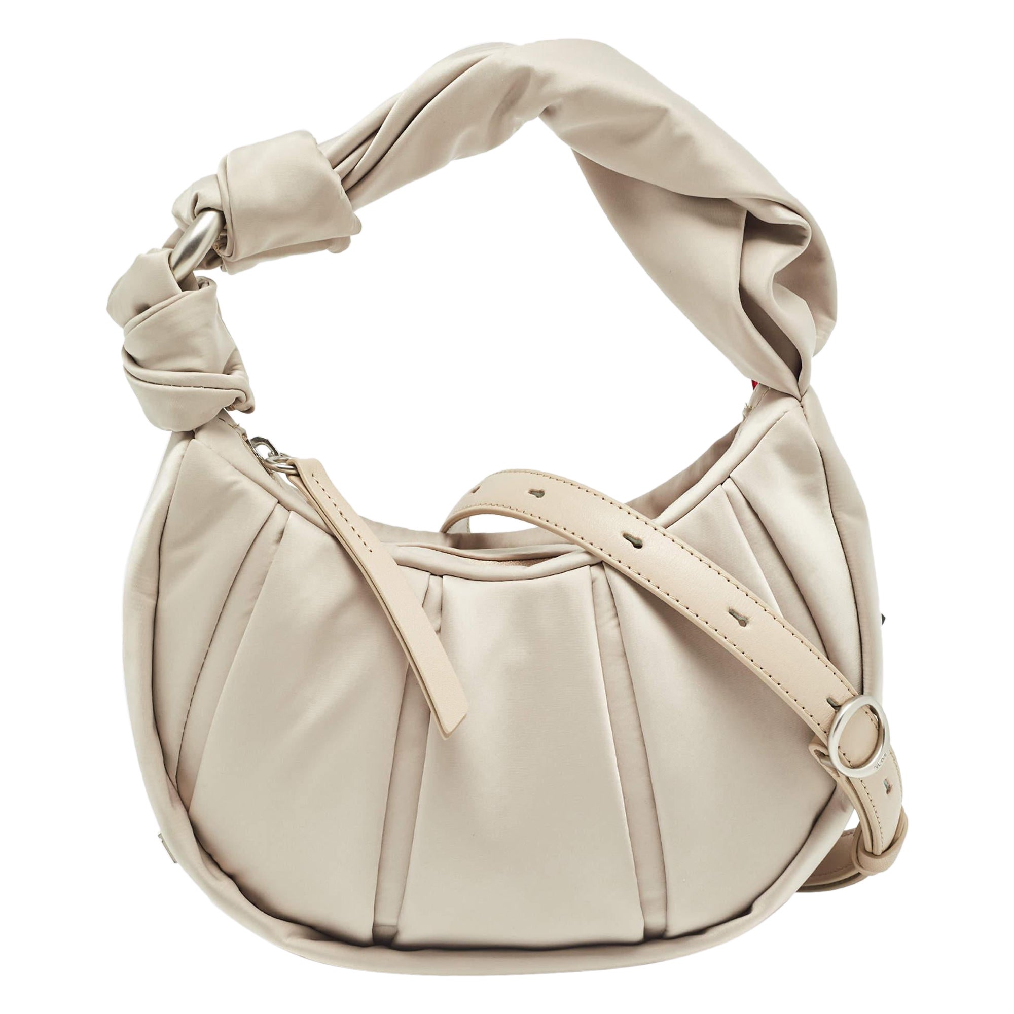 How do you tell if a TUMI bag is authentic?