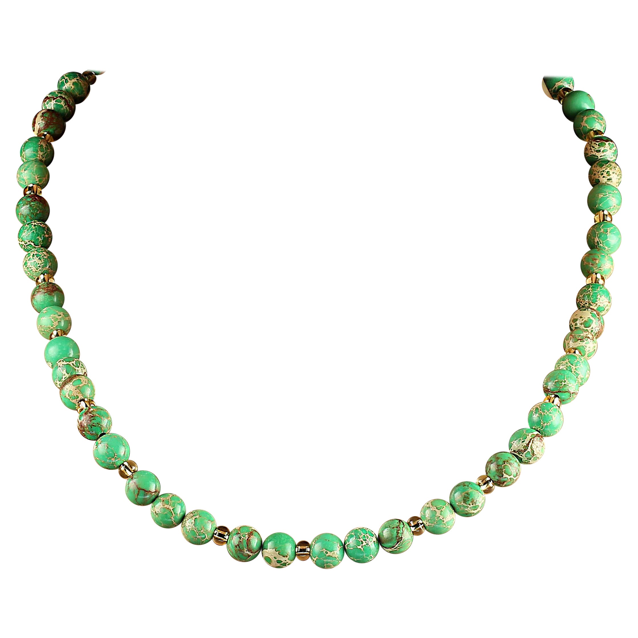 Necklace of Natural Green Imperial Stone

This stunning 20-inch necklace showcases the elegance of natural green imperial stone, a gem known for its rich color and unique texture. Perfectly capturing the fresh, vibrant tones of spring, the necklace