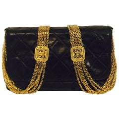  1980s Chanel Black Quilted Lambskin Flap Bag W Gold Tone Multi Chain Strap 