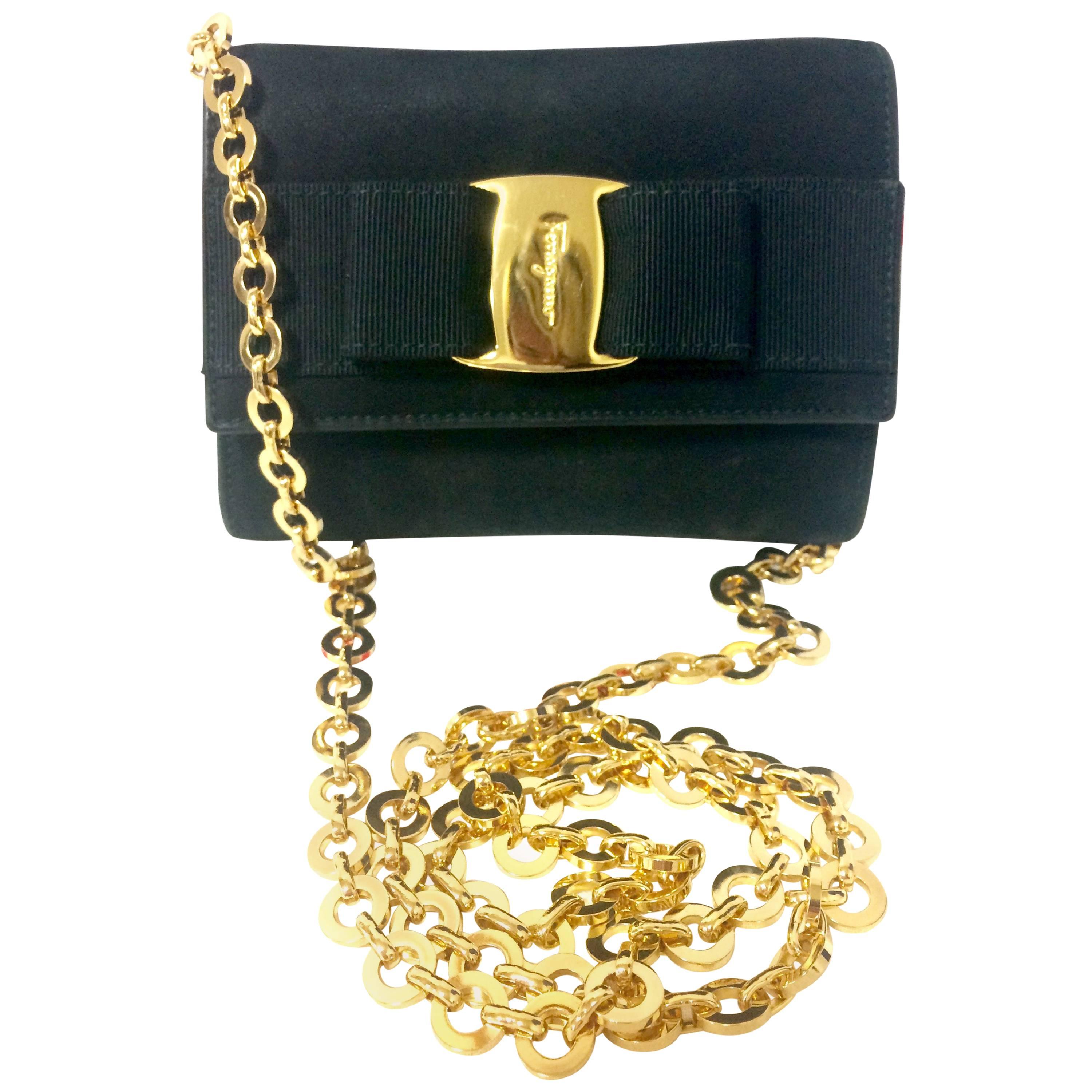 Vintage Salvatore Ferragamo black shoulder mini bag with gold chain and Vara bow For Sale