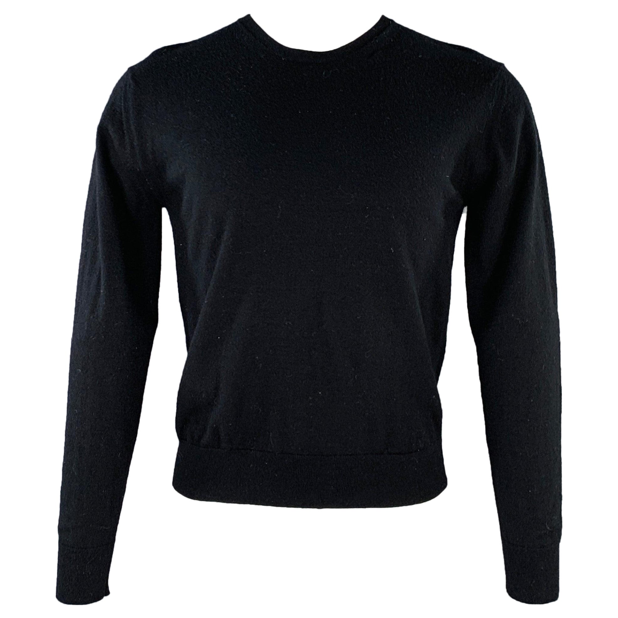NICOLE FARHI Talla S Jersey negro de punto de lana con cuello redondo en venta