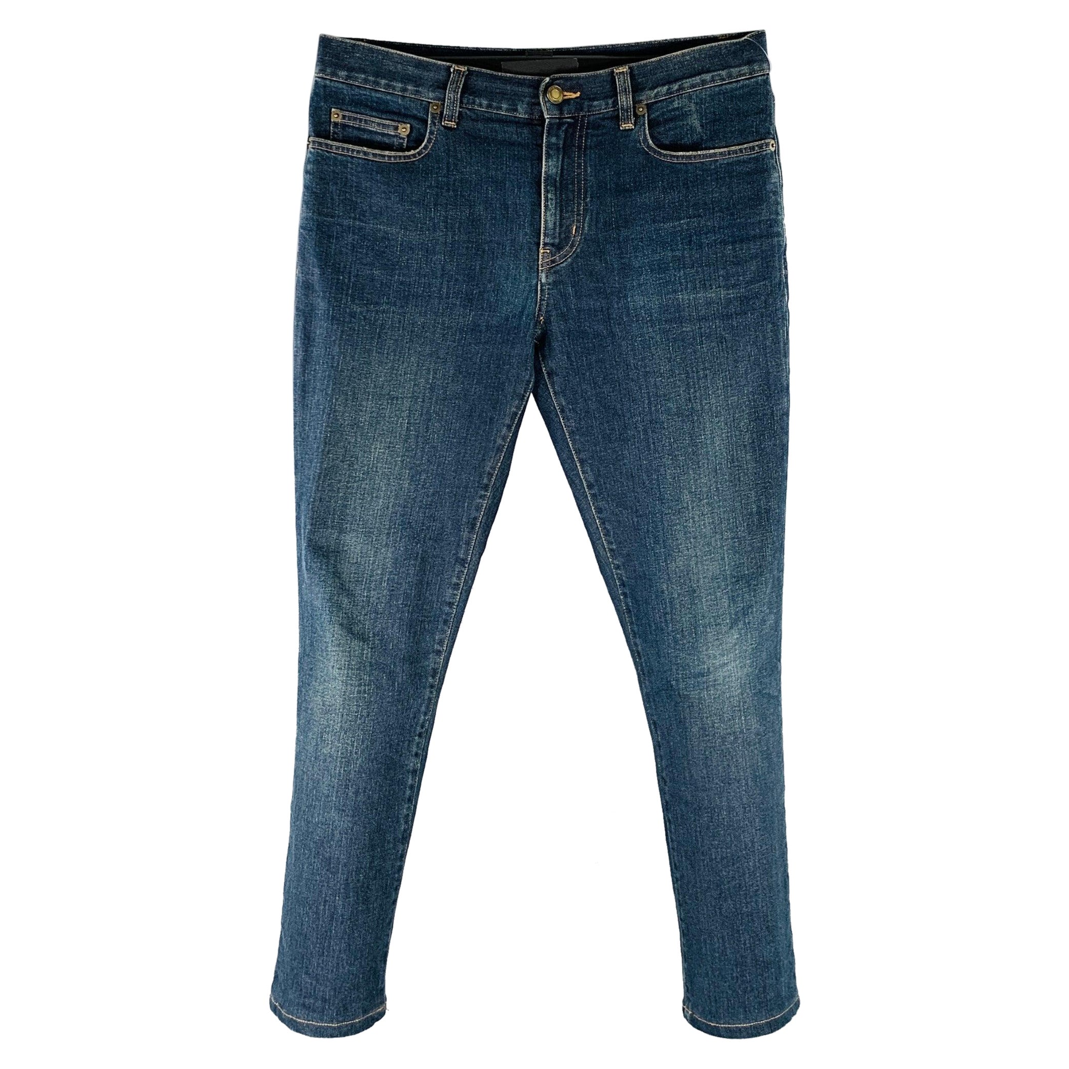 SAINT LAURENT Größe 30 Blaue gerade Jeans aus Baumwollmischung mit Kontraststich und geradem Streifen