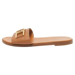 Louis Vuitton Brown Leder Lock It Flache Sandalen Größe 36.5