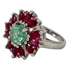 Bague cocktail en or blanc Vermeil avec émeraude naturelle certifiée et saphir bleu