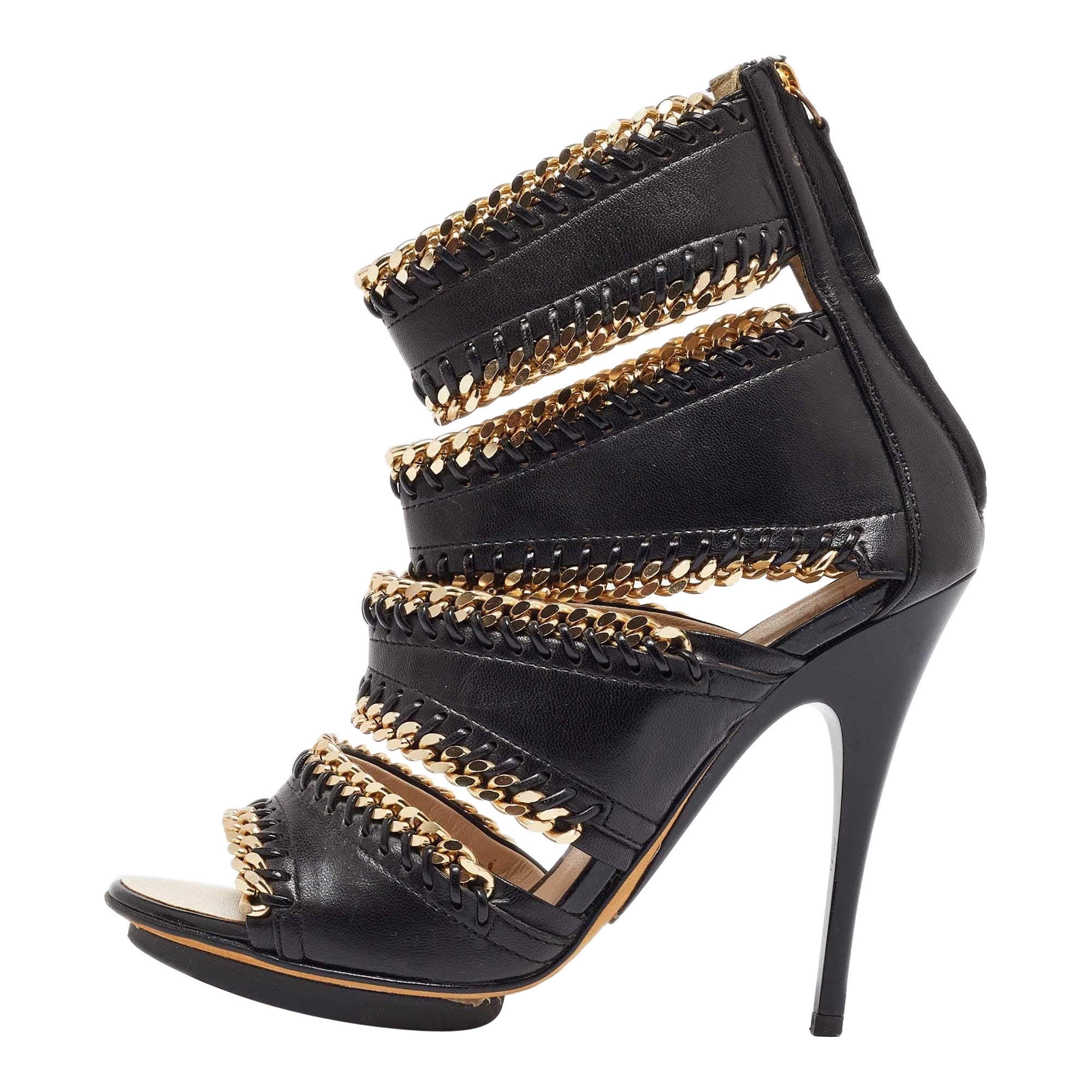 Giuseppe Zanotti Sandalias recortadas de piel negra con adornos de cadena Talla 35.5
