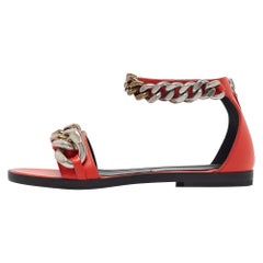 Stella McCartney Falabella flache Sandalen aus orangefarbenem Kunstleder Größe 36