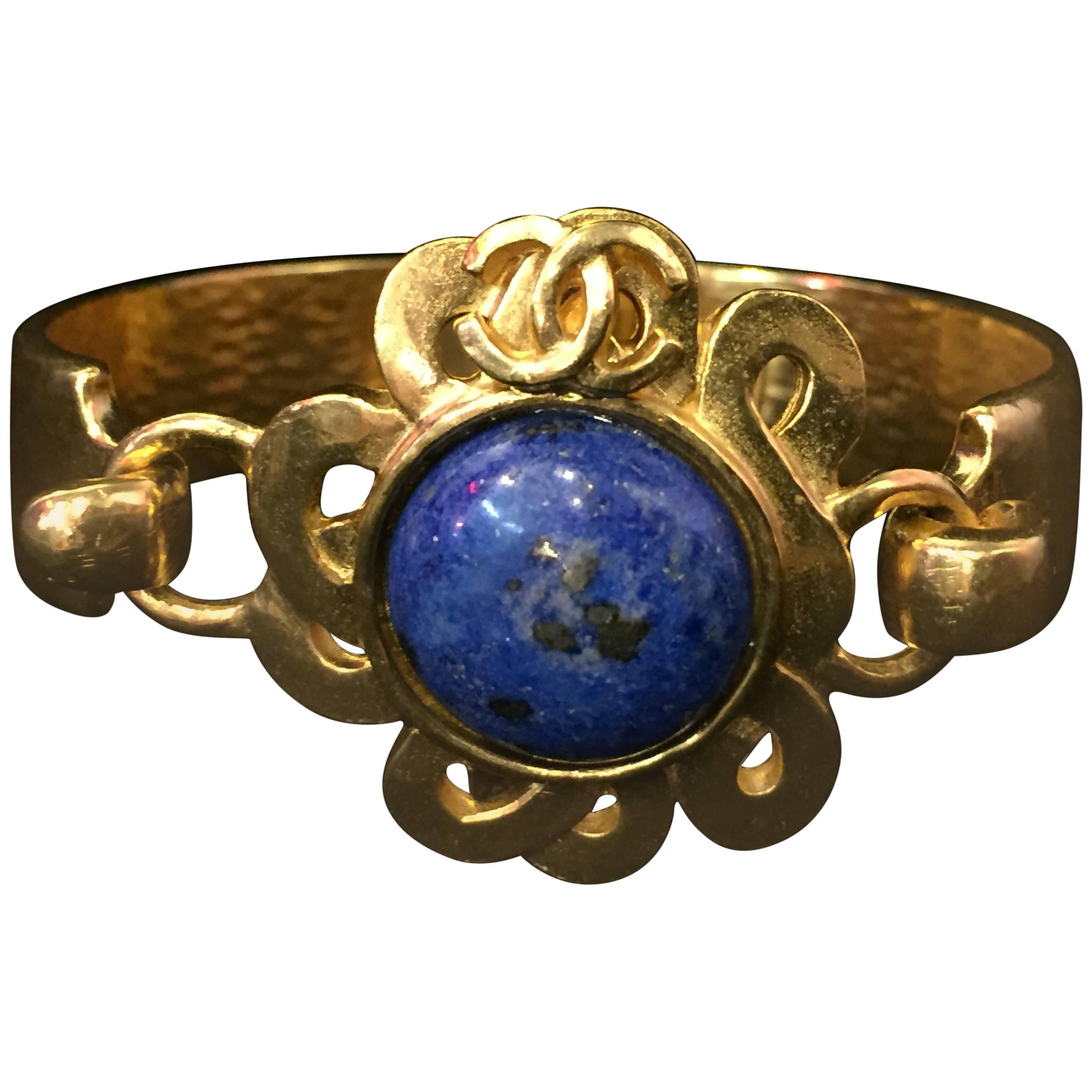 1997 Gold-Tone Hinged Lapis Lazuli "CC" Logo Sun Bracelet