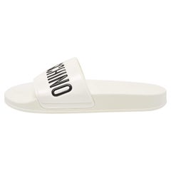 Moschino Sandali piatti in pelle bianca con logo taglia 42