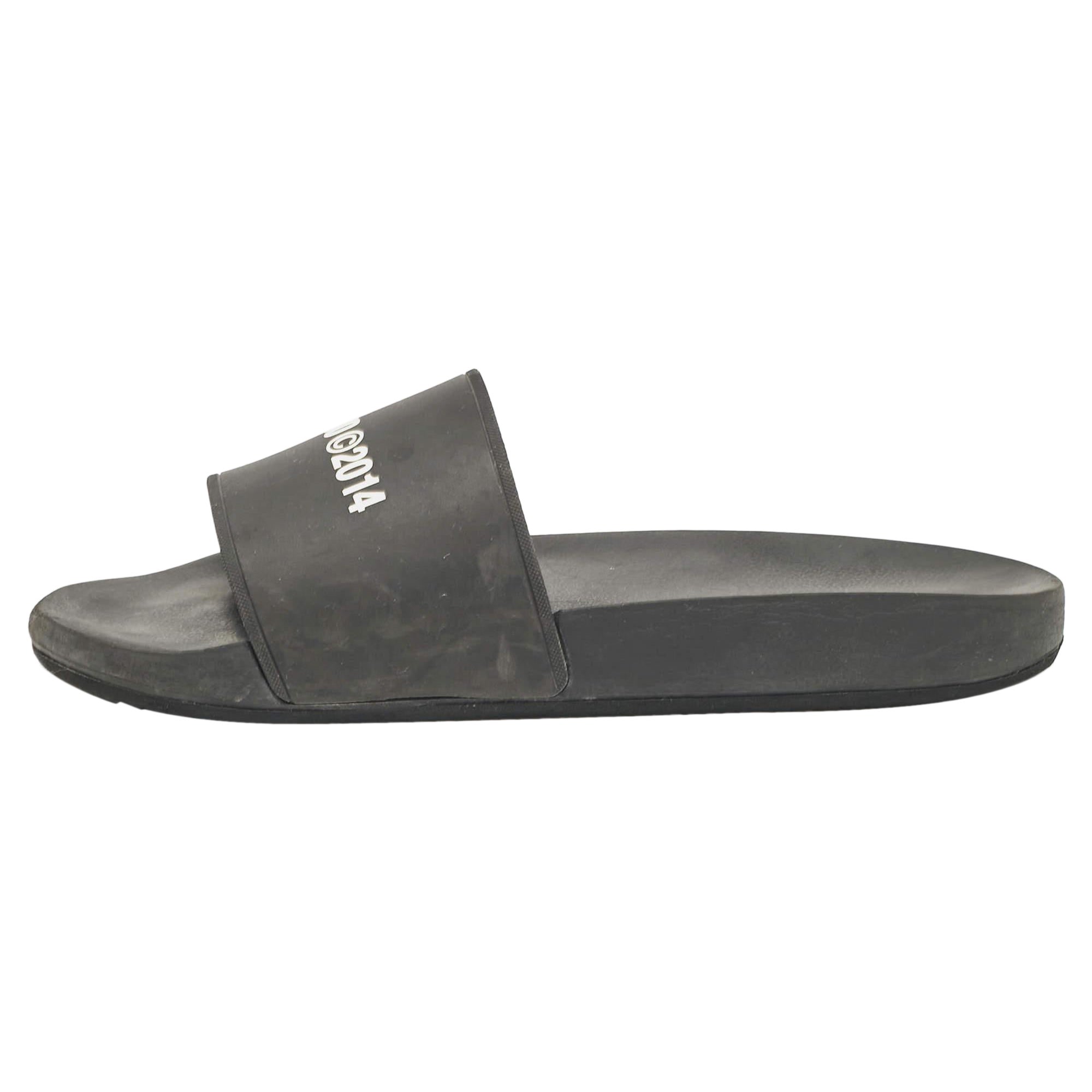Axel Arigato Slides de piscine en caoutchouc noir Taille 42