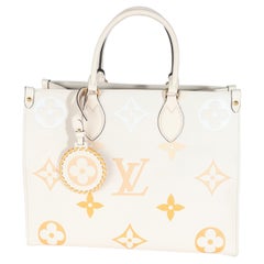 Louis Vuitton Cream Saffron Giant Monogram Empreinte Onthego MM