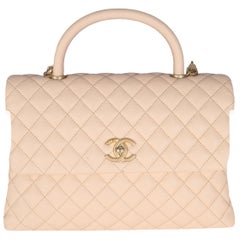 Chanel Beige gesteppte Kaviar Medium Coco Top Handle Handtasche