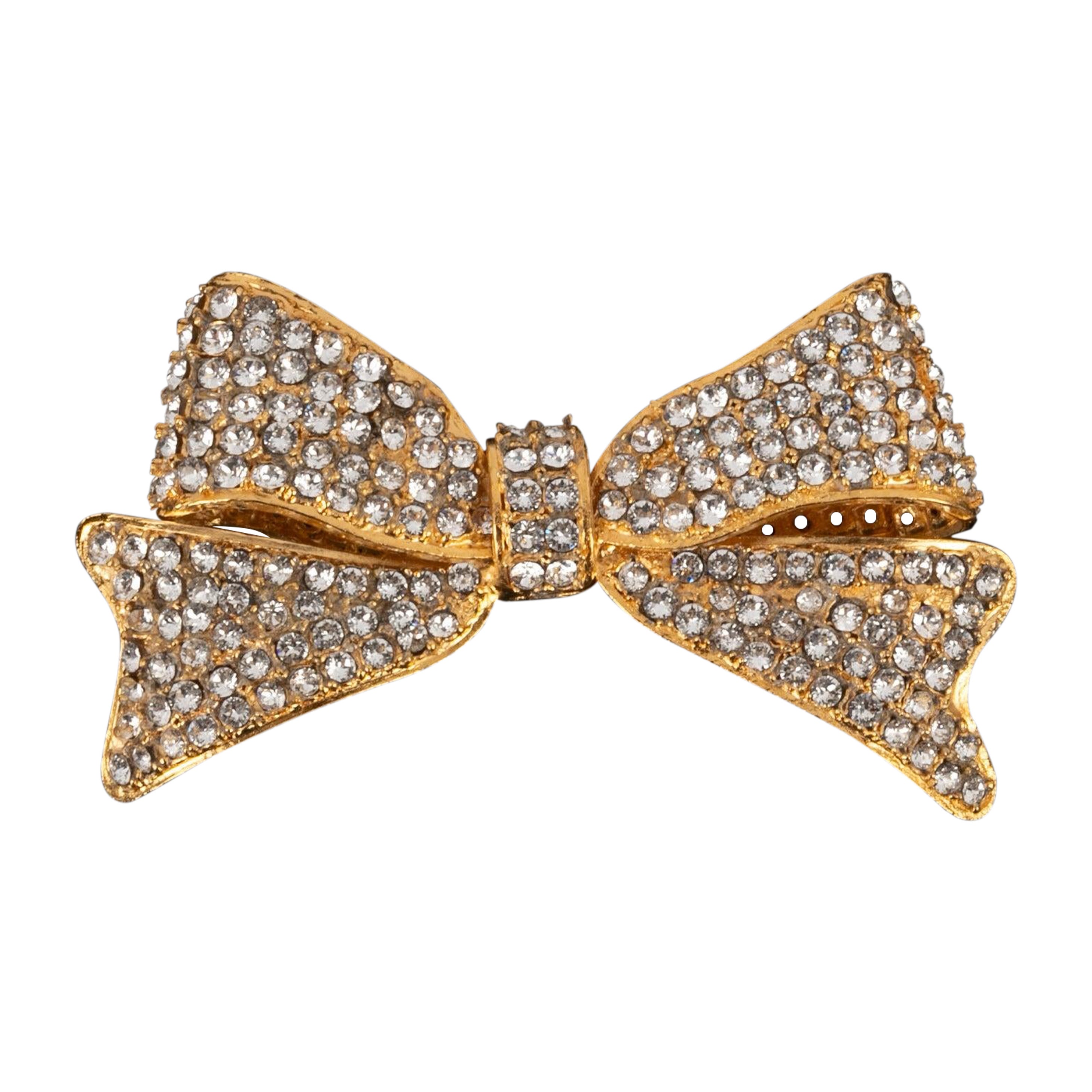 Chanel Broche de metal dorado "Lazo" Alta Costura en venta