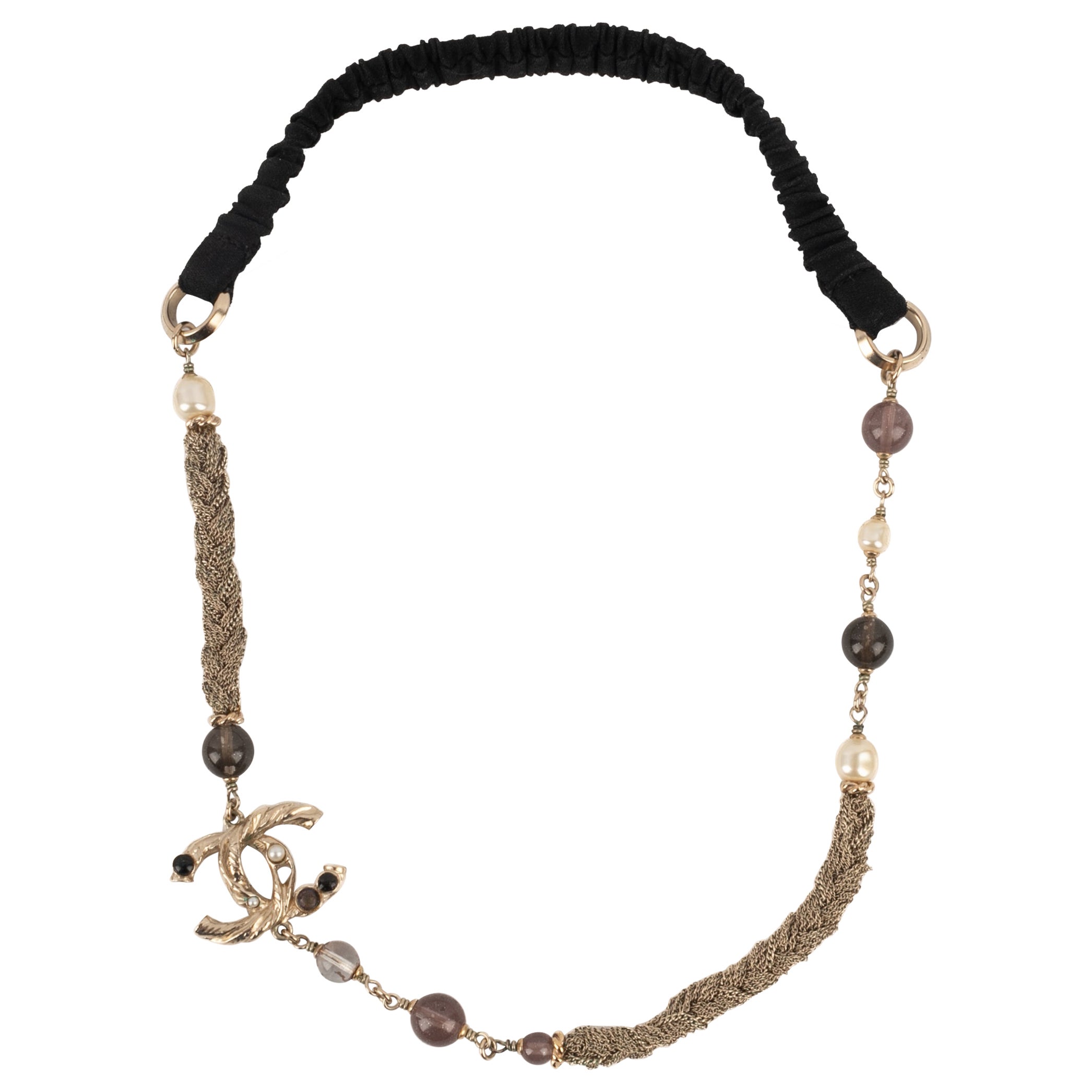 Chanel Champagne Metal Head Jewelry