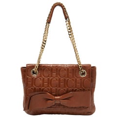 CH Carolina Herrera Borsa a tracolla Audrey in pelle marrone con monogramma