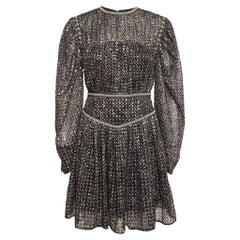 Maje Schwarzes Minikleid aus Pailletten-Krepp mit Plissee S
