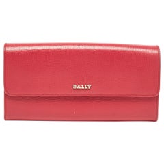 Portafoglio continentale con patta e logo in pelle rosa di Bally