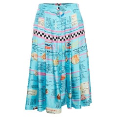 Moschino Couture jupe midi plissée en soie bleue avec imprimé menu déroulant, taille M