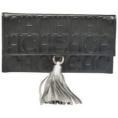 Carolina Herrera Black Monogram Embossed Leather Tassel Clutch