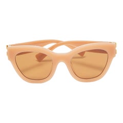 Lunettes de soleil yeux de chat Miu Miu Peach SMU 01Y Logo