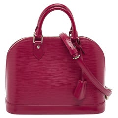 Sac Alma PM en cuir épi fuchsia Louis Vuitton