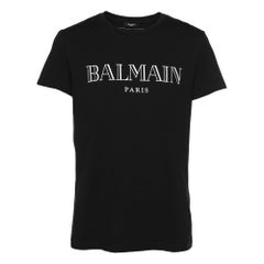 Balmain Schwarzes Kurzarm-T-Shirt aus bedruckter Baumwolle mit Logon in Schwarz M