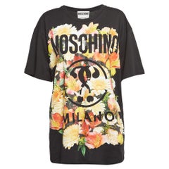 Moschino Couture Camiseta oversize con logo floral negra L