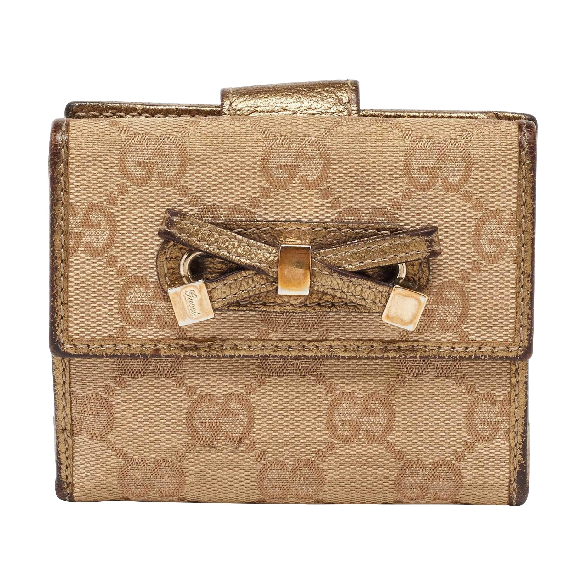 Gucci Beige/Gold GG Canvas and Leather Compact Wallet For Sale