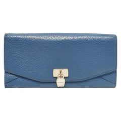 Portafoglio continentale con patta e logo in pelle blu di Aigner